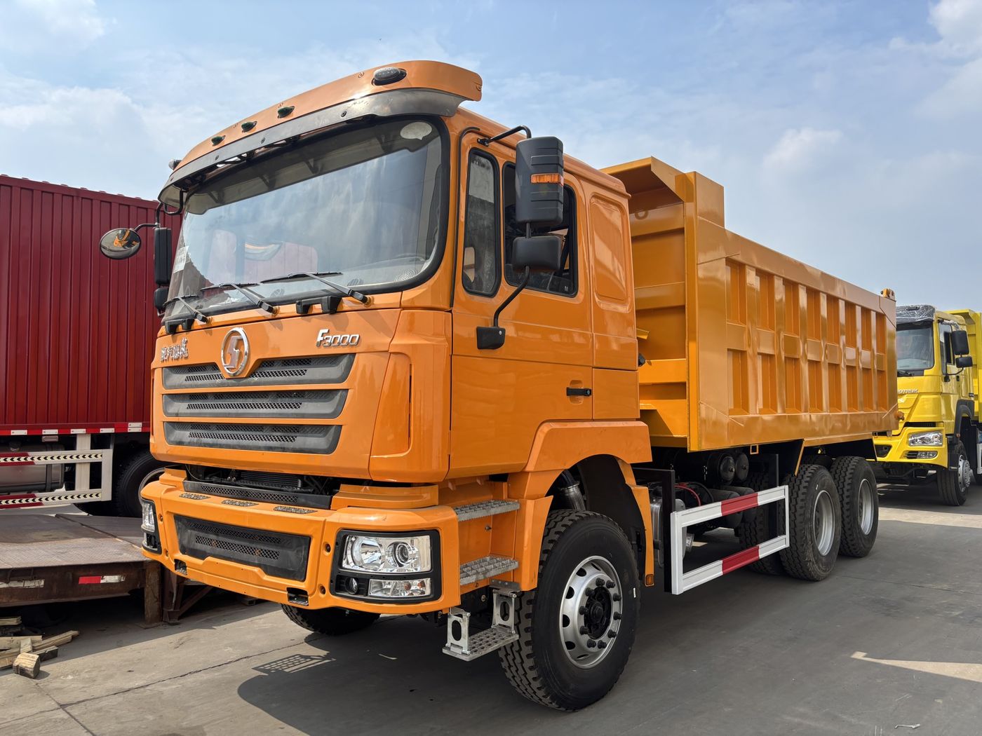 Orange SHACMAN F3000 6x4 dump truck, current vehicle photo