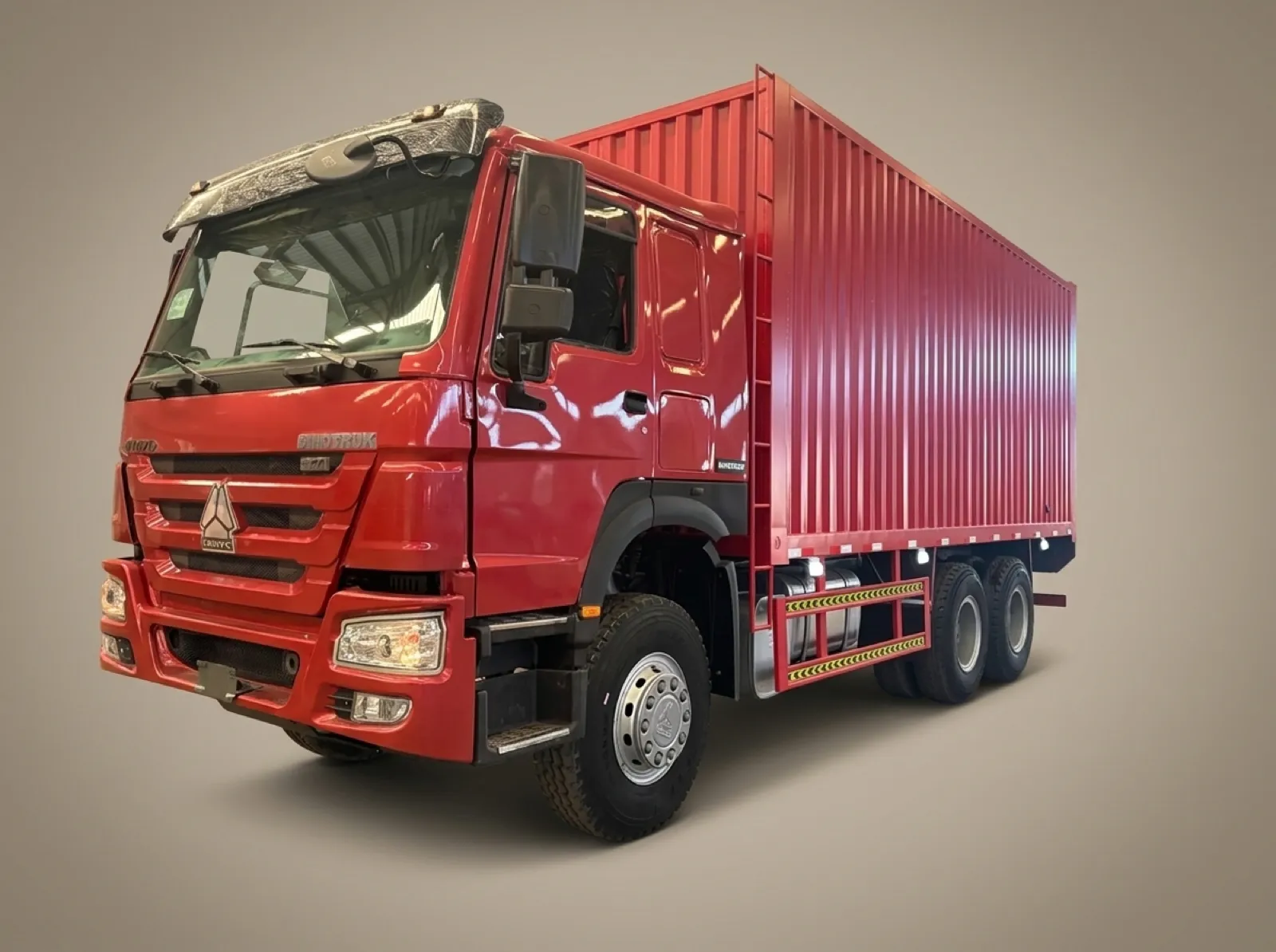 HOWO 371 6×4 Box Van Truck – Front three-quarter view