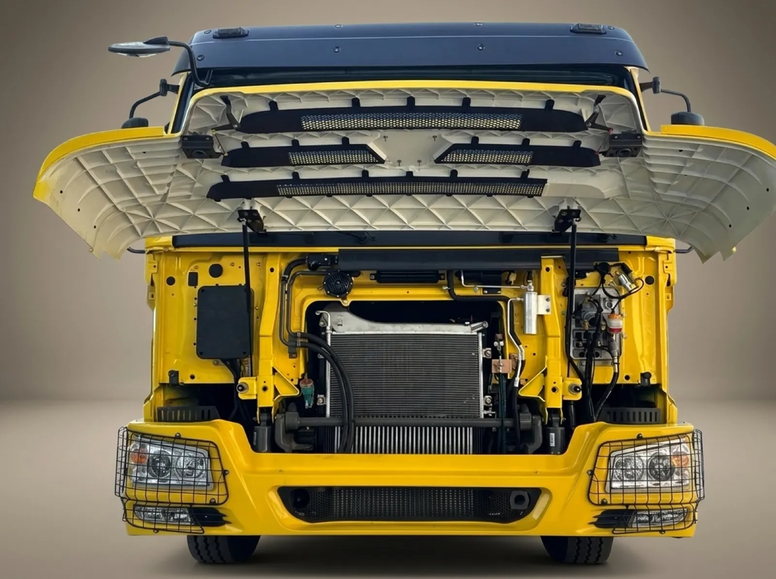 HOWO 371 6×4 Dump Truck (Square Box) – Front grille and engine access