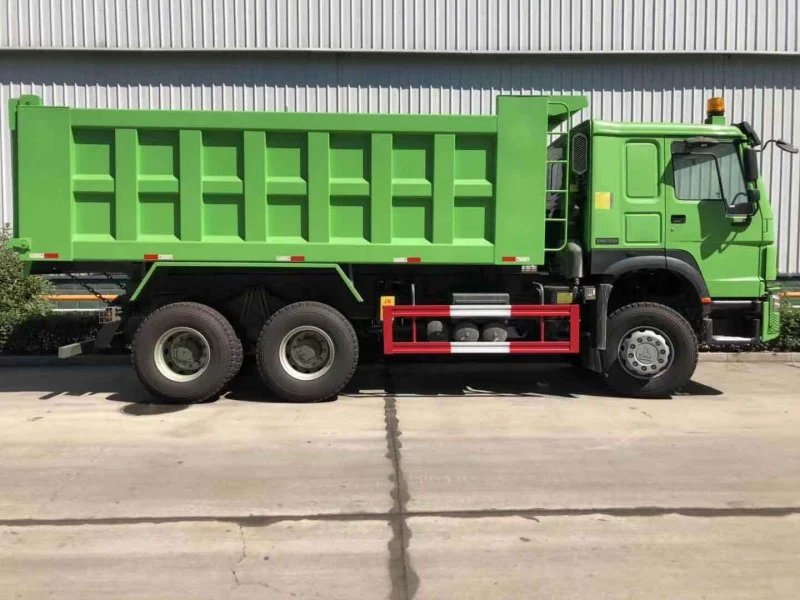 Chassis close-up of HOWO 6×4 Dump Truck inside SINOTRUK manufacturing workshop.