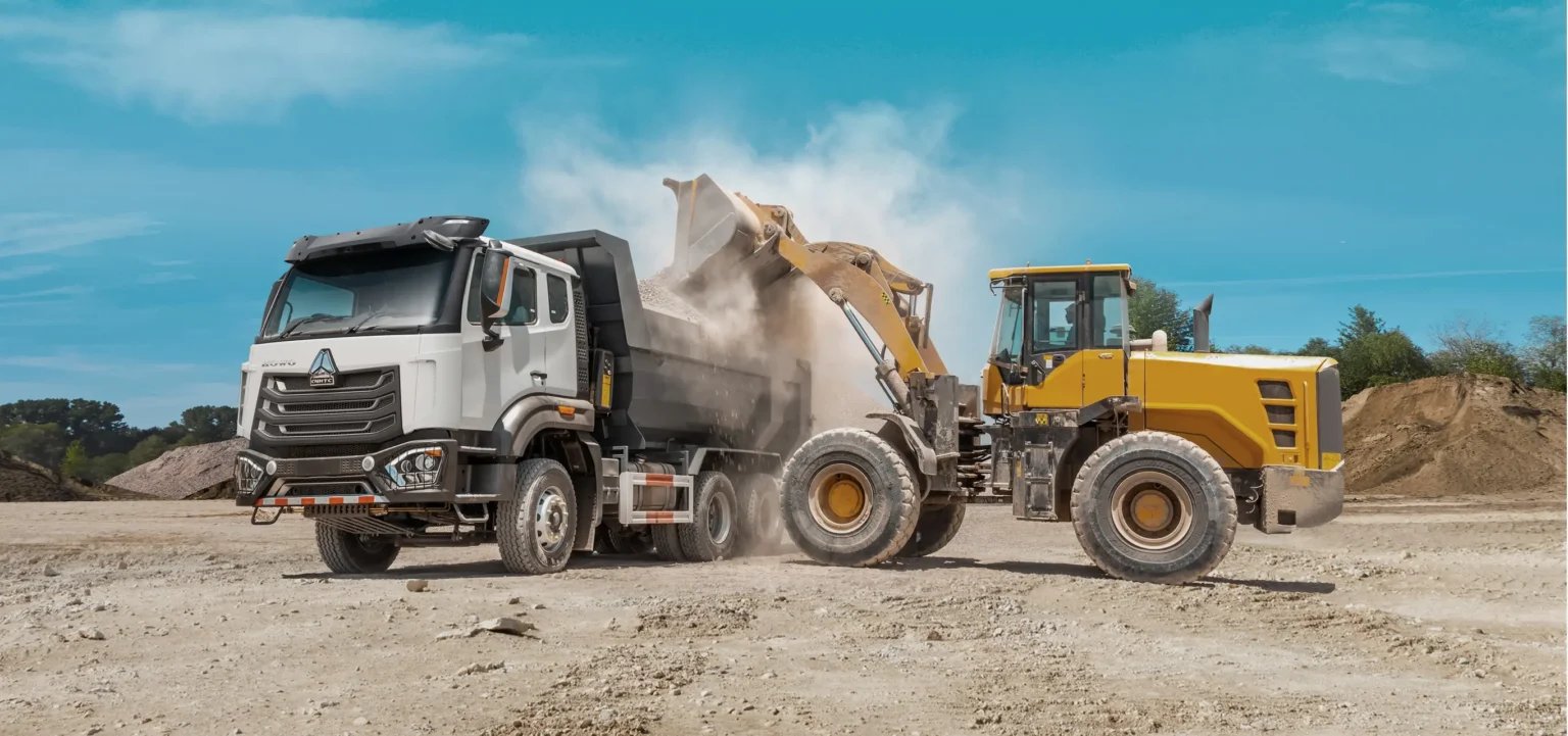 SINOTRUK HOWO NX 6×4 dump truck hauling crushed stone in a quarry