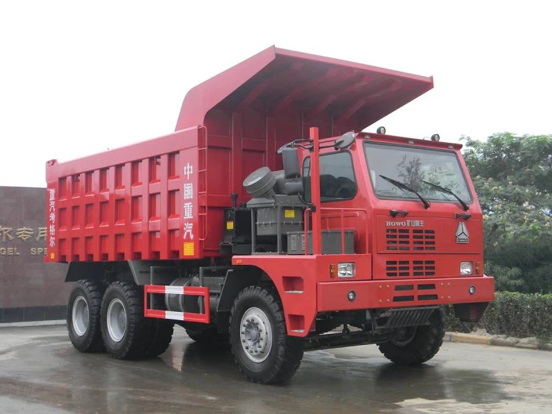 SINOTRUK HOWO Mining Dump Truck operating in an open-pit mine with 14.00-25 mining tyres and heavy reduction axles.